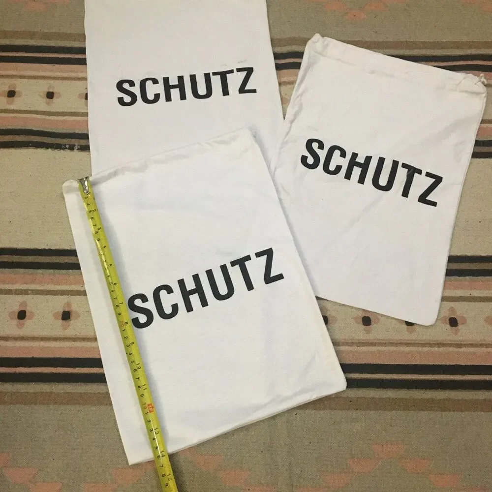 Three (3) Schutz white w/ black lettering soft material Dust bag 14” x 10”